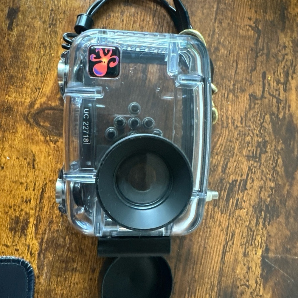 Transparent Underwater Camera Housing with Black Accents